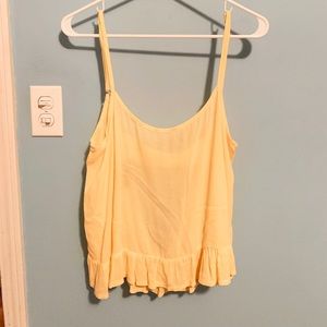 Yellow (slightly) open back tank
